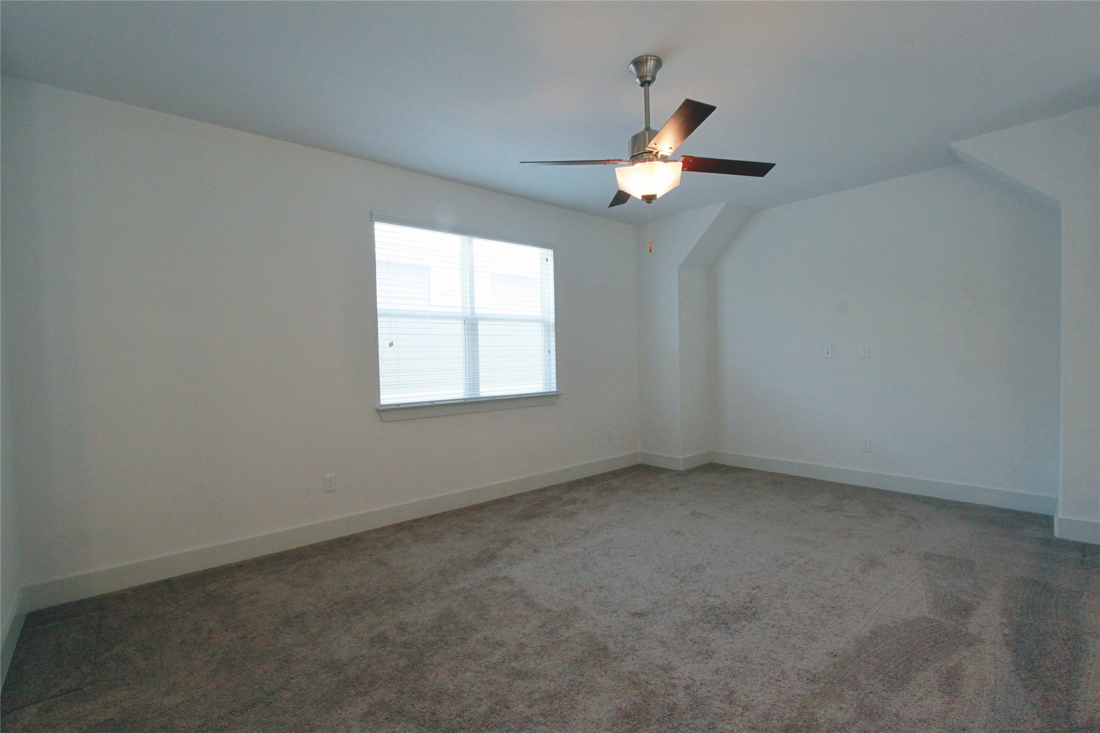 1507 Homespun Road Austin, TX 78745 - Photo 23 of 35 Carpeted room featuring a ceiling fan with integrated lighting, a window with blinds, white walls, and white baseboards