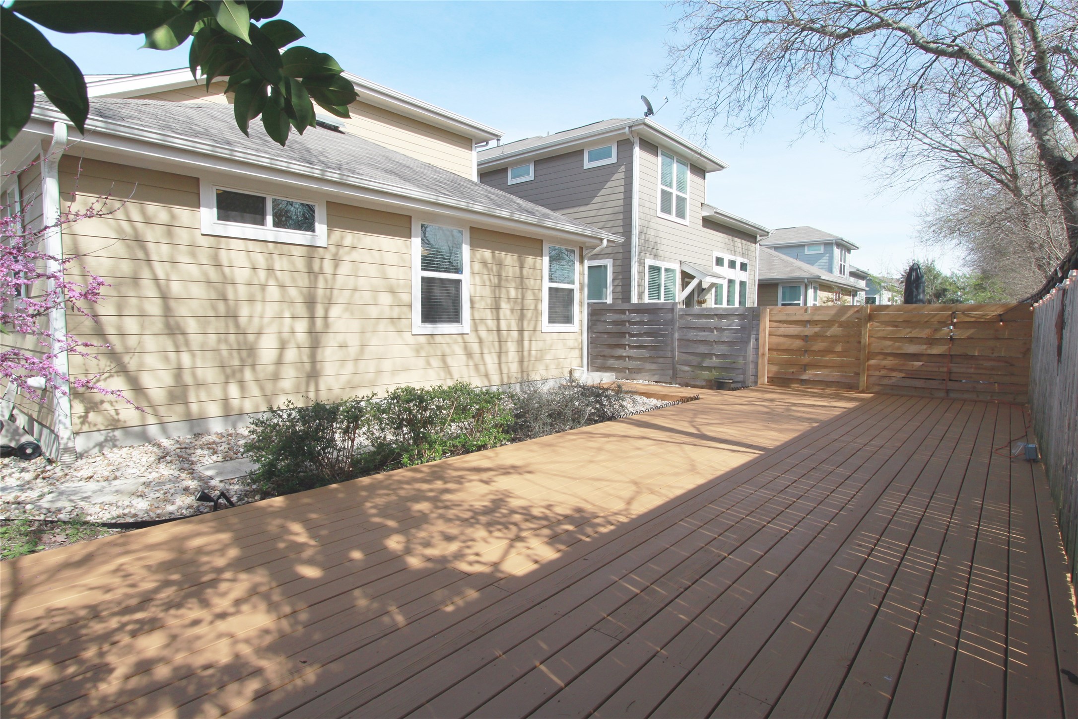 1507 Homespun Road Austin, TX 78745 - Photo 35 of 35 Spacious outdoor deck with horizontal wood fencing