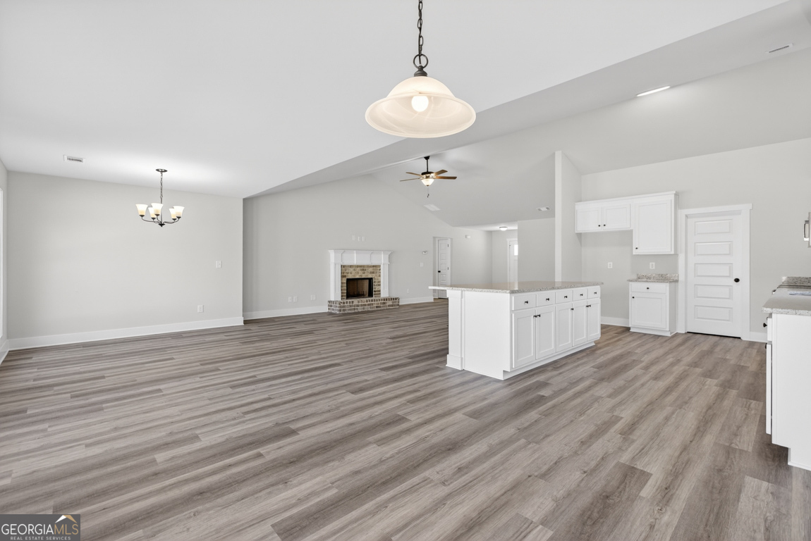 569 Liberty Hill Road, Unit 29 Hartwell, GA 30643 - Photo 16 of 46 a view of kitchen and hall with wooden floor