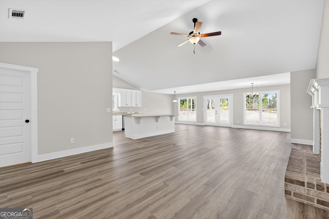 569 Liberty Hill Road, Unit 29 Hartwell, GA 30643 - Photo 3 of 46 wooden floor in an empty room with a window