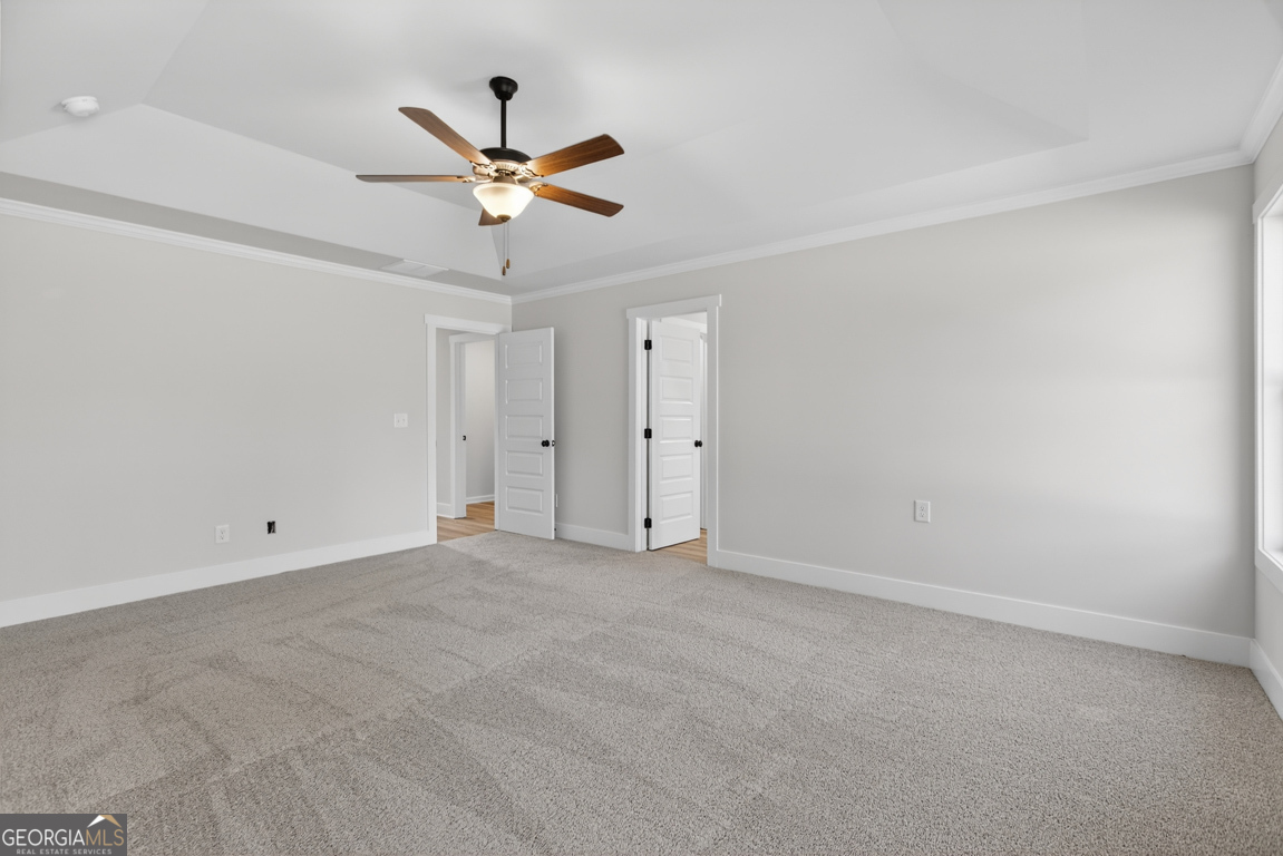 569 Liberty Hill Road, Unit 29 Hartwell, GA 30643 - Photo 37 of 46 a view of a ceiling fan with a window
