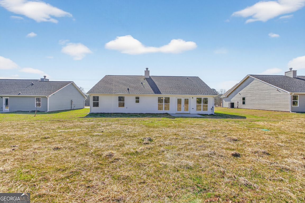 569 Liberty Hill Road, Unit 29 Hartwell, GA 30643 - Photo 46 of 46 a front view of a house with a garden