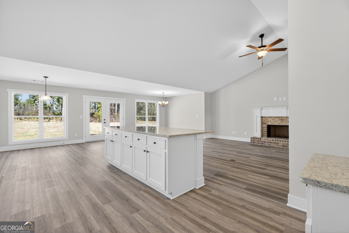 569 Liberty Hill Road, Unit 29 Hartwell, GA 30643 - Photo 10 of 46 a view of a room with wooden floor and window