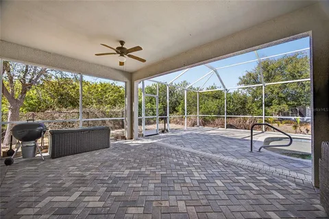 a view of a swimming pool with a porch