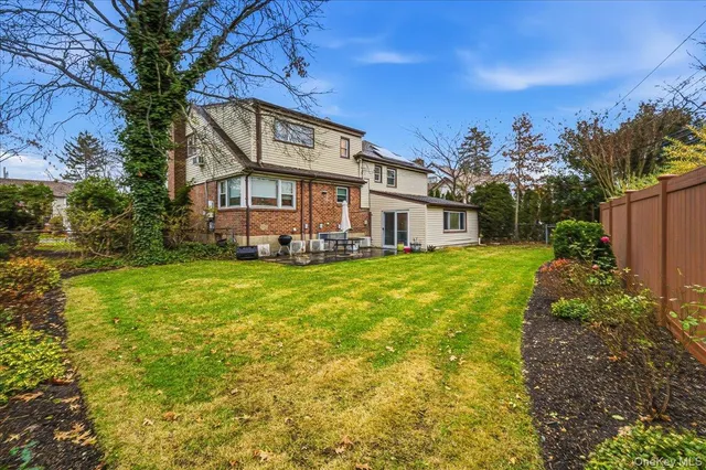 a view of a house with a big yard