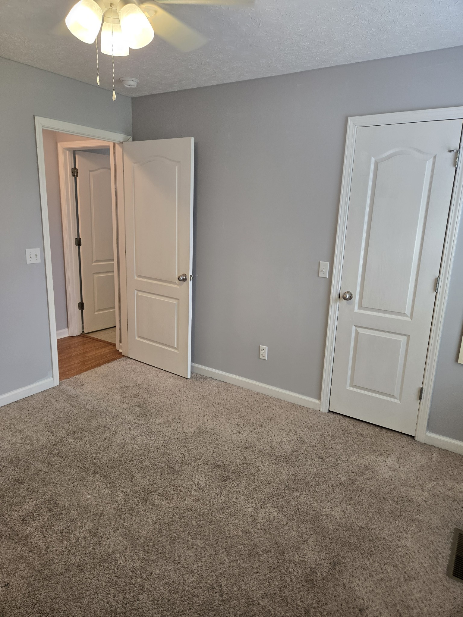 180 Shaub Road Portland, TN 37148 - Photo 17 of 19 a view of a room with an empty room and chandelier fan