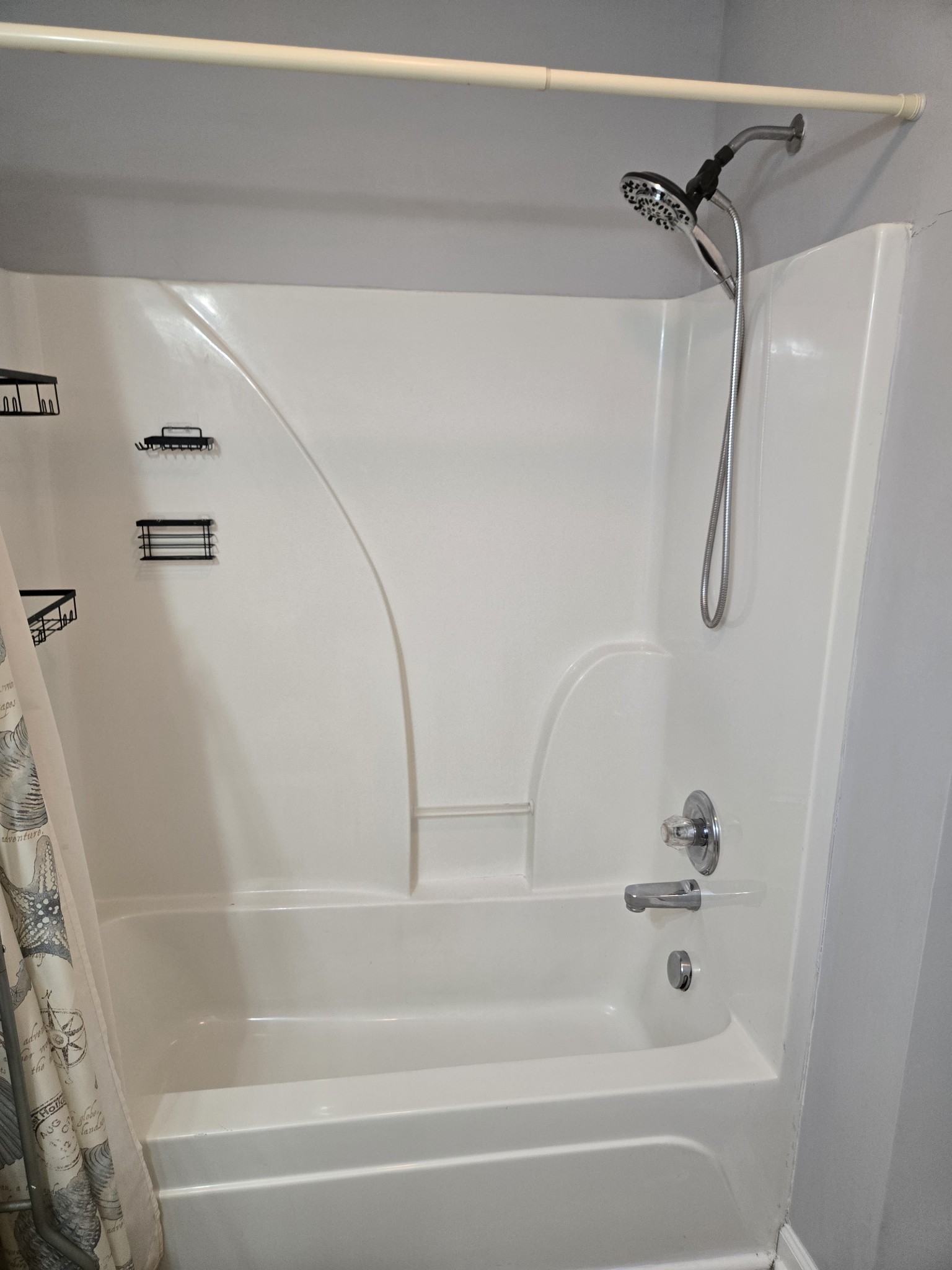 180 Shaub Road Portland, TN 37148 - Photo 19 of 19 a bathroom with a bath tub with a shower