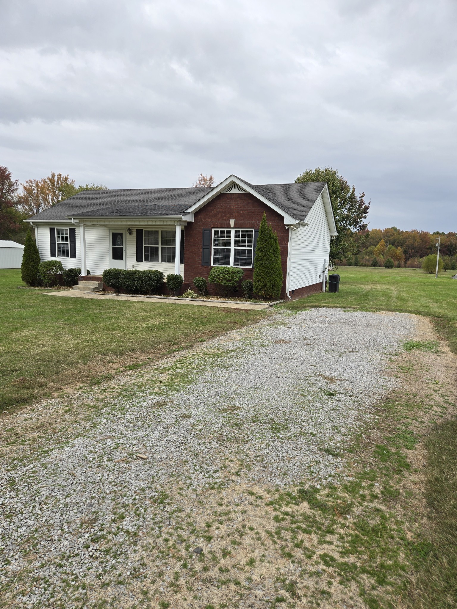 180 Shaub Road Portland, TN 37148 - Photo 2 of 19 a front view of a house with a yard