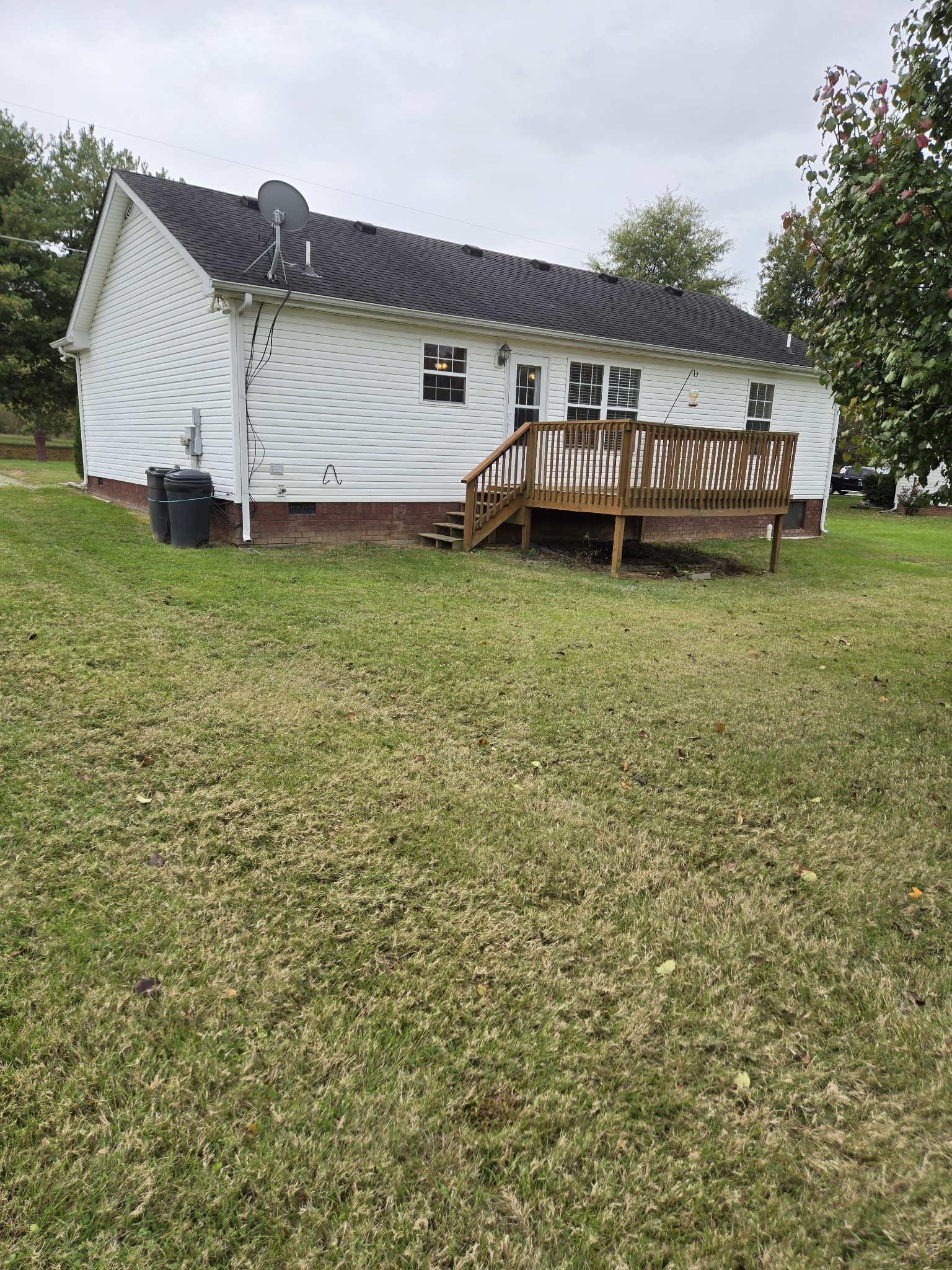 180 Shaub Road Portland, TN 37148 - Photo 3 of 19 a view of a house with a backyard and a patio