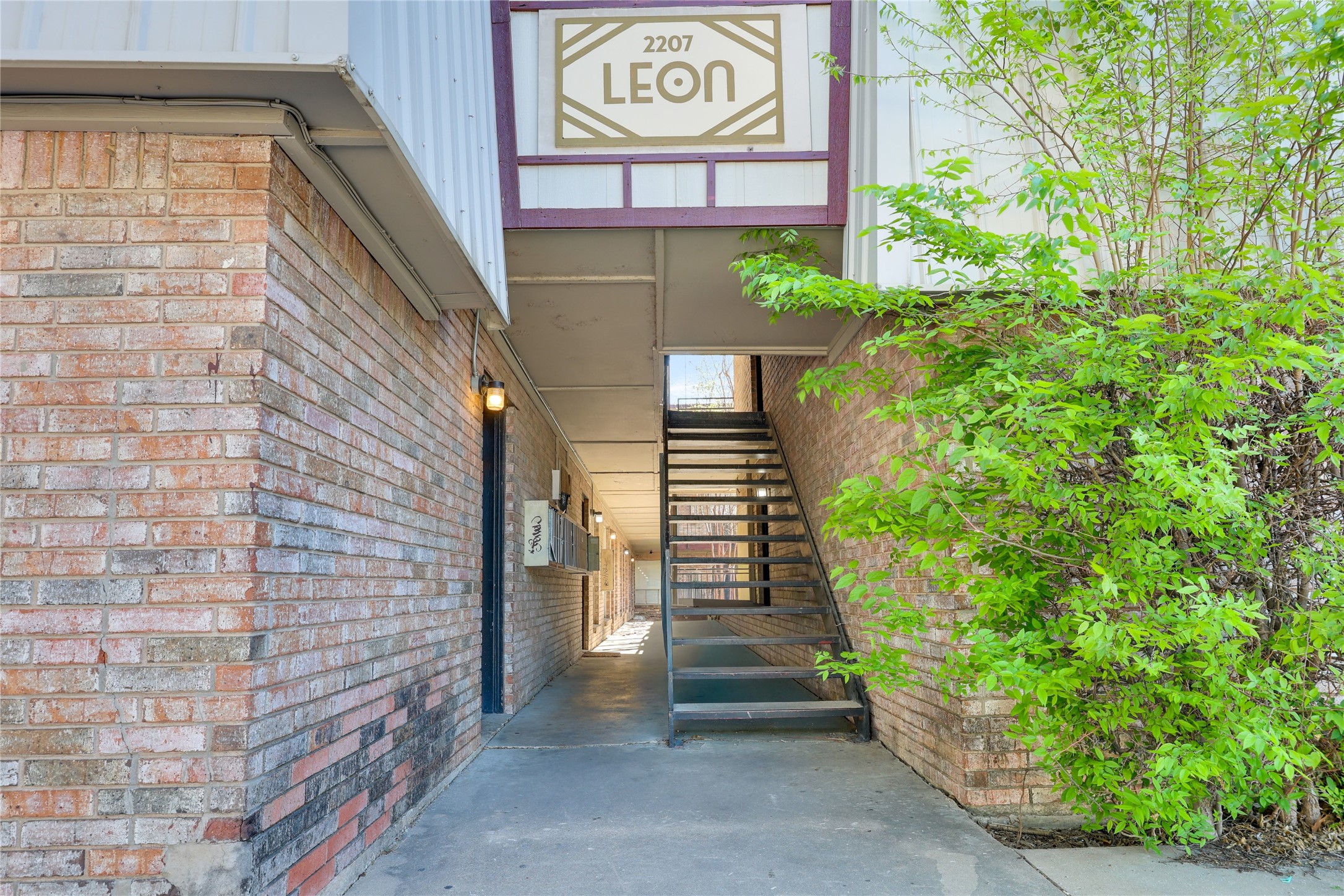2207 Leon Street, Unit 204 Austin, TX 78705 - Photo 11 of 19 a view of a pathway along with potted plants