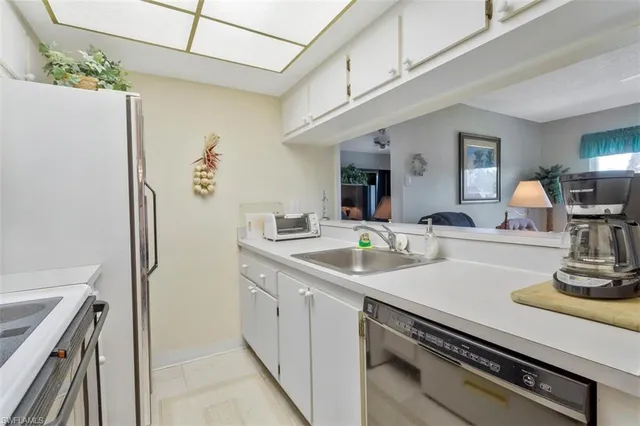 a bathroom with a sink a vanity and a mirror