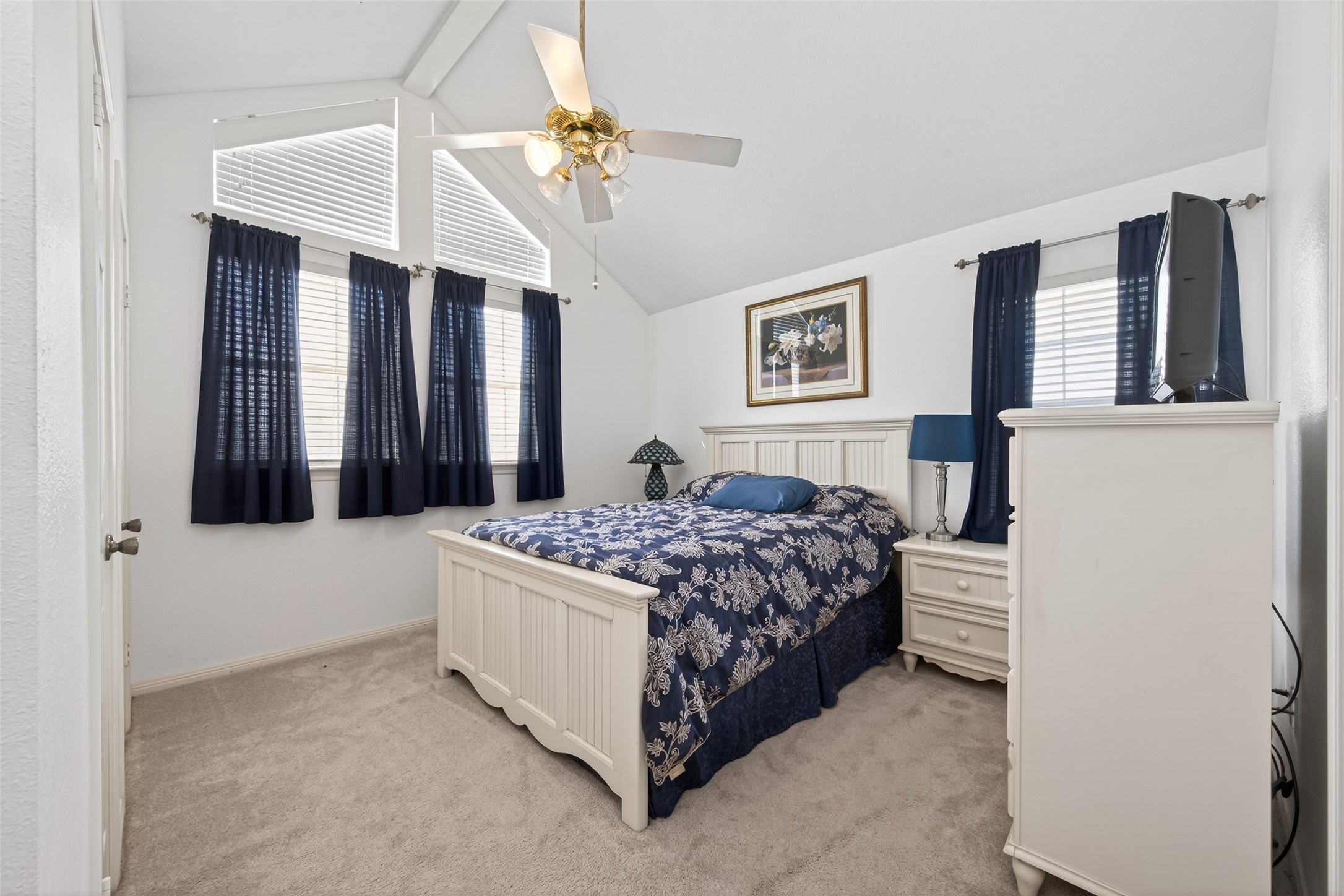1608 Krenek Road Crosby, TX 77532 - Photo 27 of 49 a bedroom with a bed lamp and a window