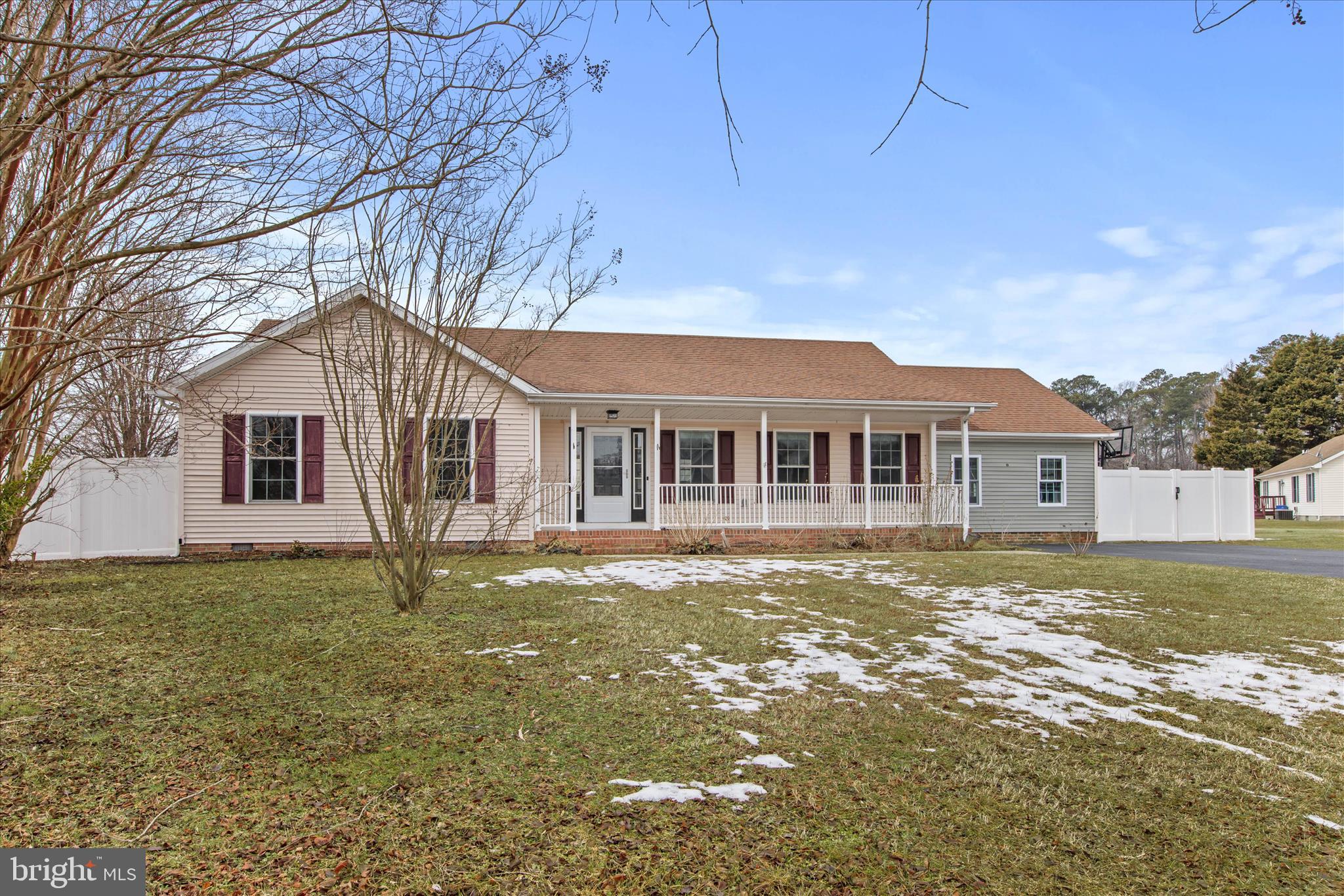 310 Autumn Ridge Drive Hebron, MD 21830 - Photo 3 of 25 a front view of a house with a yard
