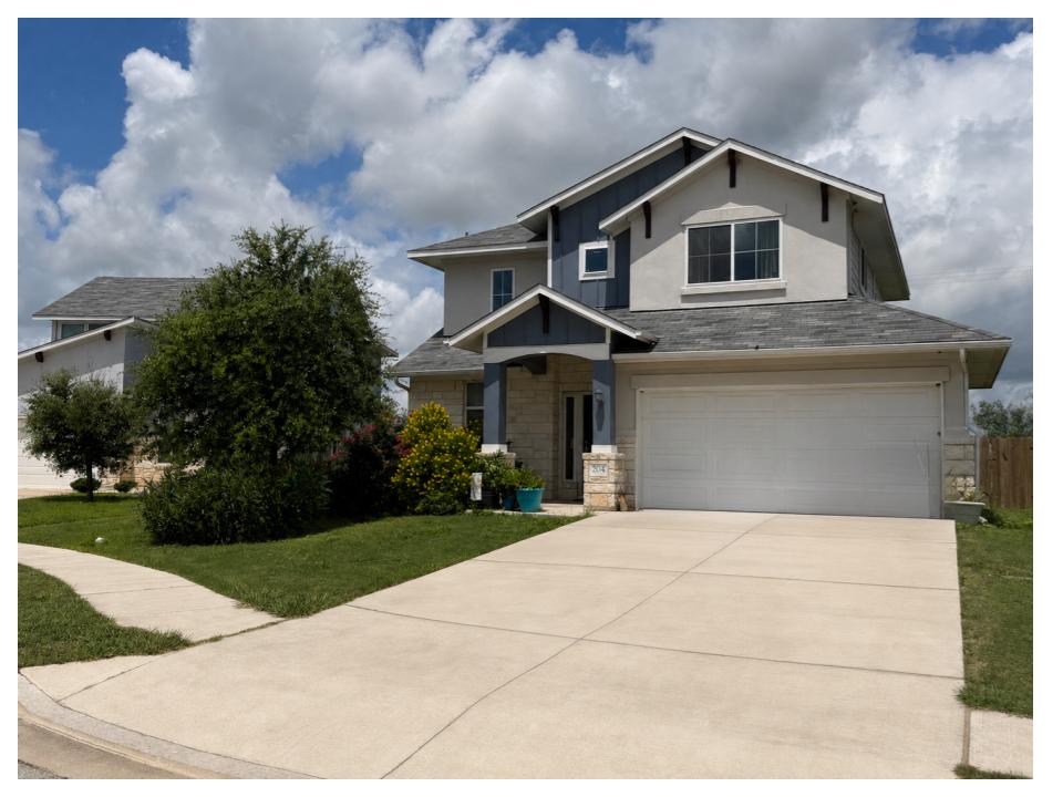 204 West Point Way Elgin, TX 78621 - Photo 1 of 1 A traditional two-story residence with a concrete driveway and mature landscaping.