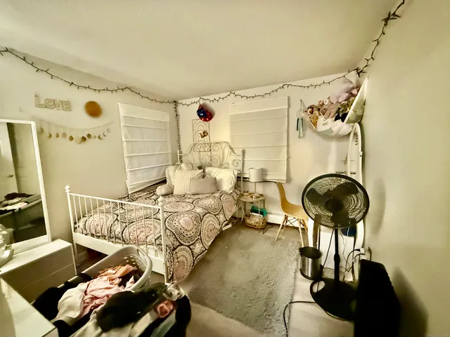 a living room with a couch and a table