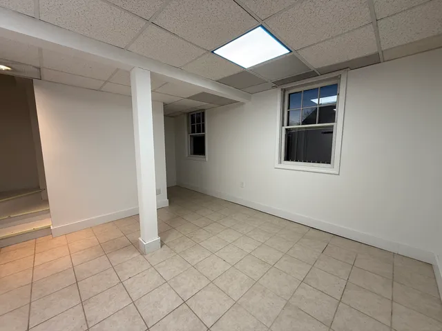 a garage with a stove and washer