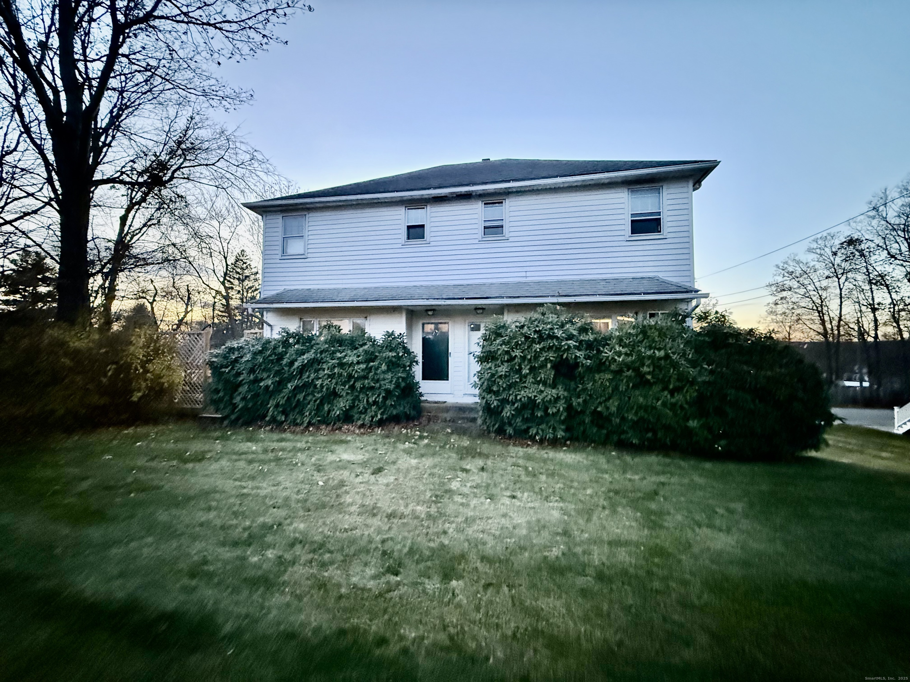 141 East High Street East Hampton, CT 06424 - Photo 17 of 17 a front view of house with yard and green space