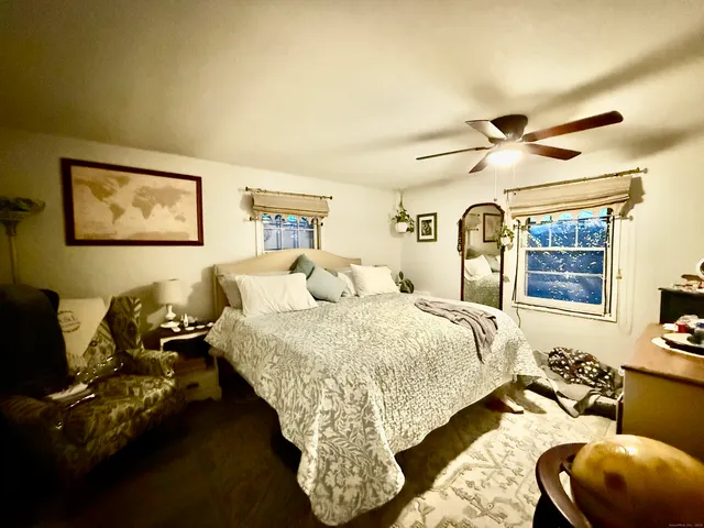 a bed room with a bed and a couch