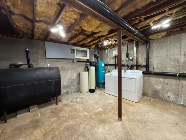 a kitchen with a refrigerator and a sink