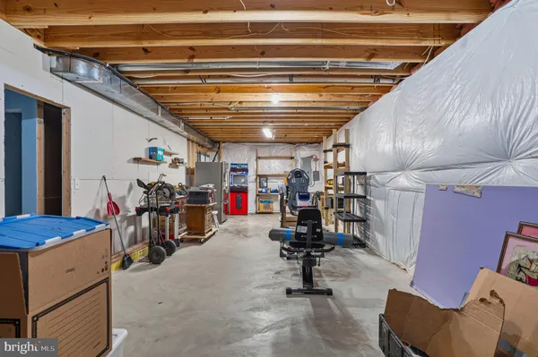 a view of a chairs and table in a patio