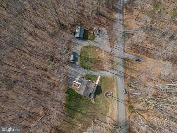 a backyard of a house with seating space