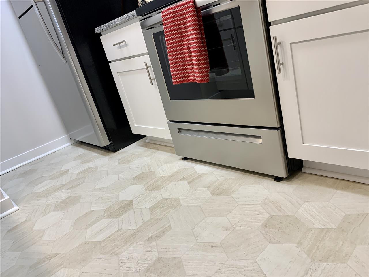 3803 Chimney Ridge Place, Unit 207 Durham, NC 27713 - Photo 12 of 27 I love the flooring choice that ties everything together with a modern flair. Flooring