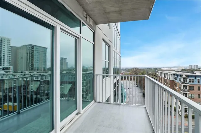 a view of a balcony with city view