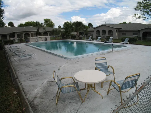 a view of a chairs and table on the terrace