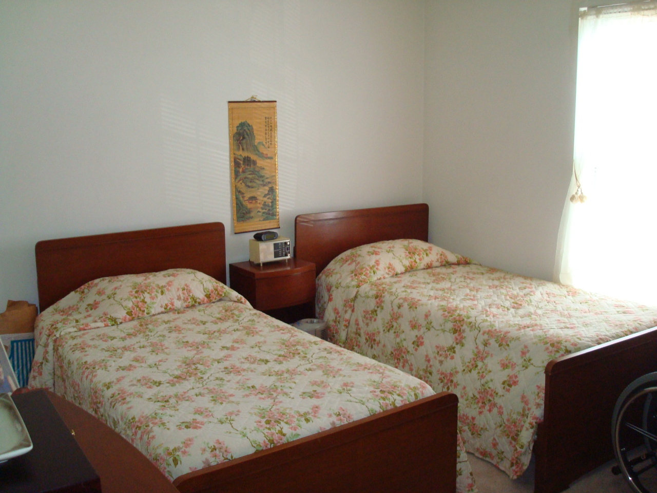 4438 Pheasant Ridge Road, Unit 208 Roanoke, VA 24014 - Photo 14 of 24 a bed sitting in a bedroom next to a window