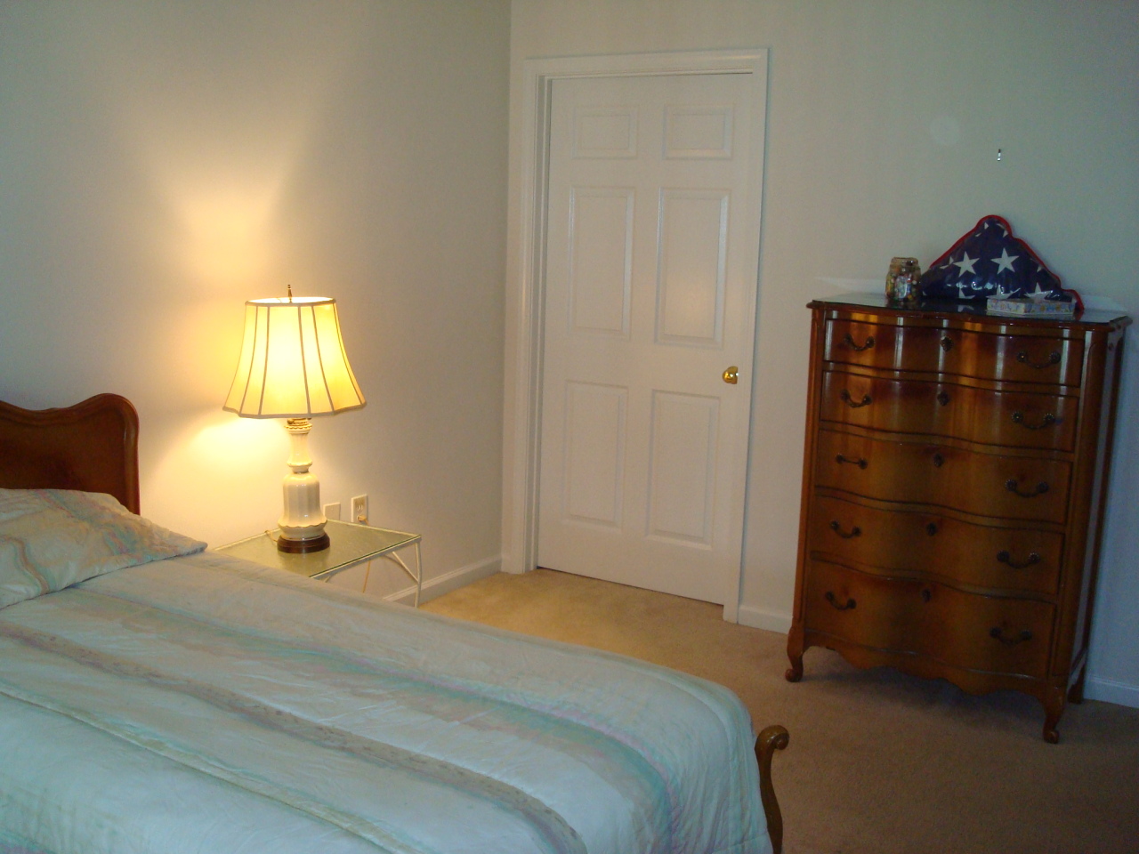 4438 Pheasant Ridge Road, Unit 208 Roanoke, VA 24014 - Photo 19 of 24 a bedroom with a bed and a lamp