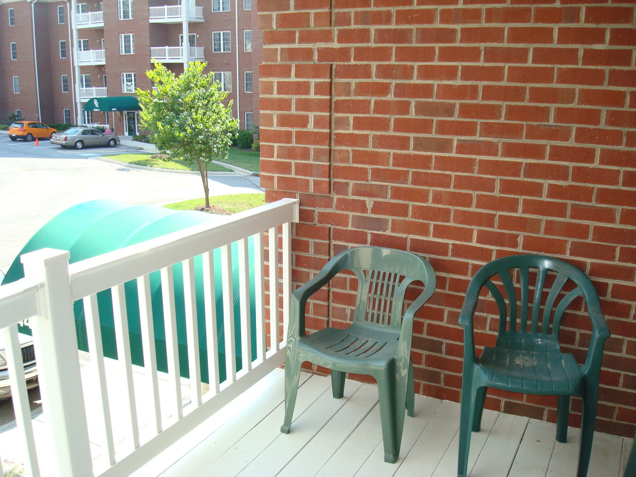 4438 Pheasant Ridge Road, Unit 208 Roanoke, VA 24014 - Photo 22 of 24 a view of a chairs and table in the patio