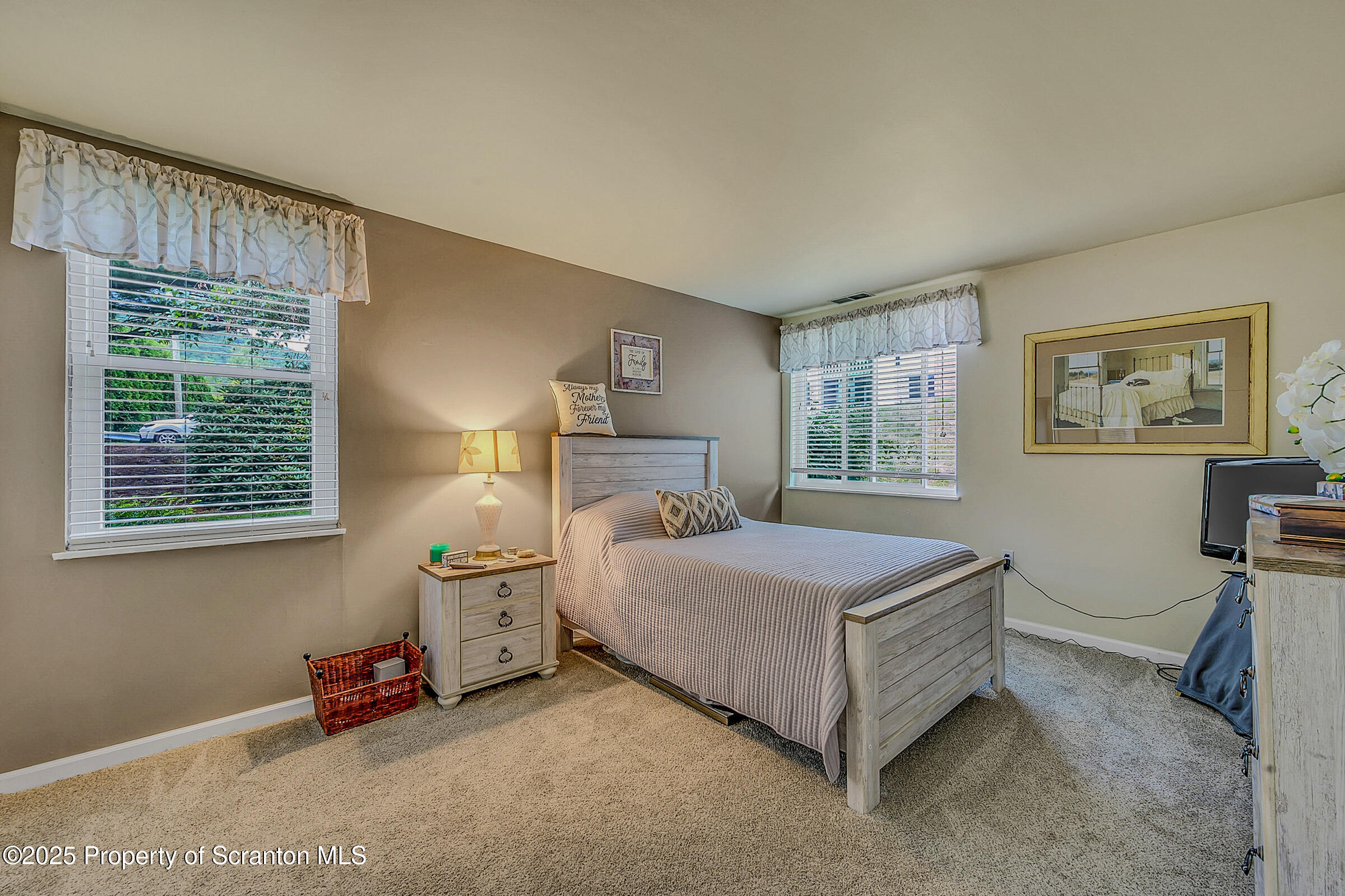 1504 Summit Pointe, Unit 1504 Scranton, PA 18508 - Photo 17 of 22 a spacious bedroom with a bed and window