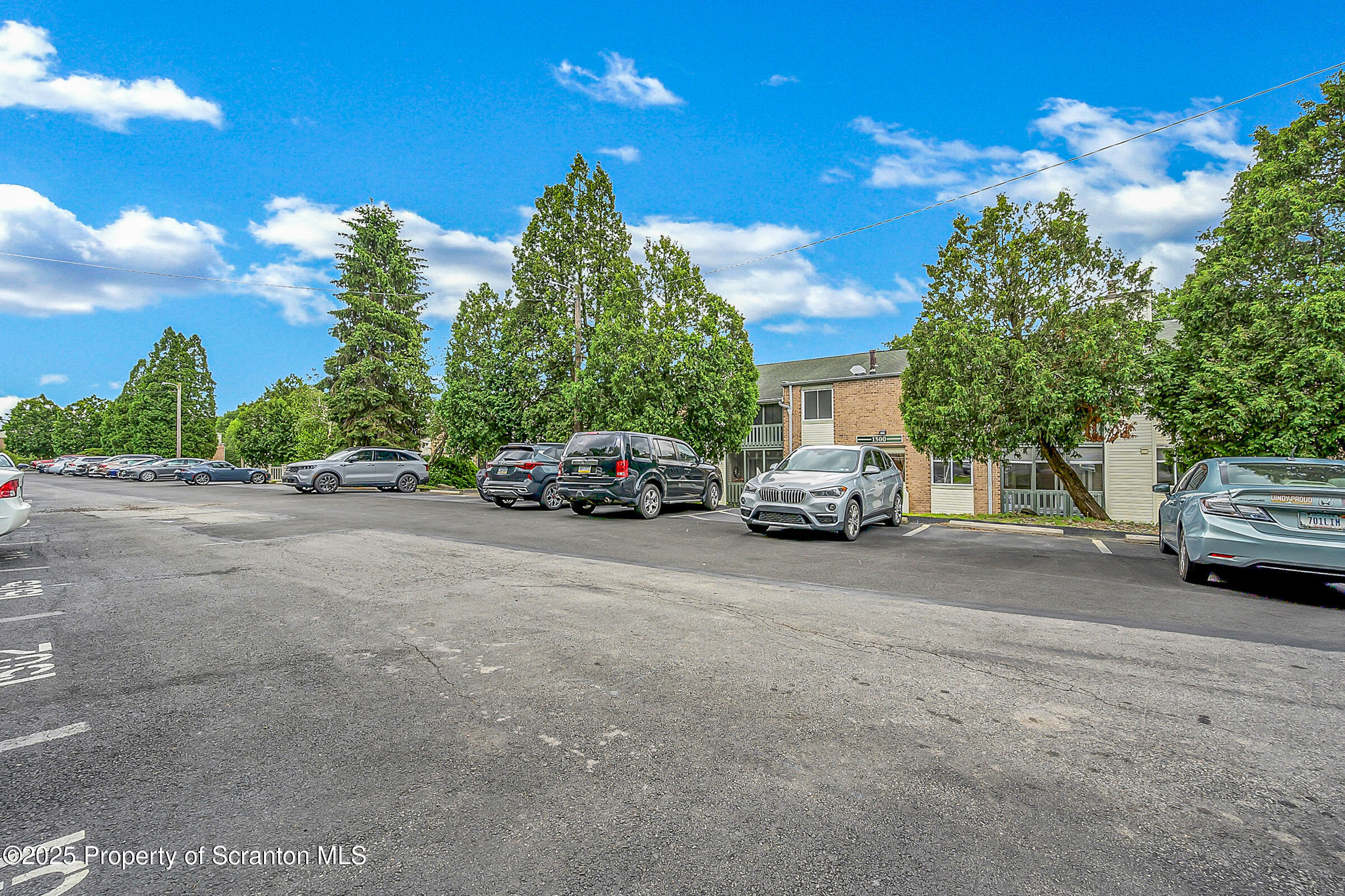 1504 Summit Pointe, Unit 1504 Scranton, PA 18508 - Photo 21 of 22 a car parked in front of a house