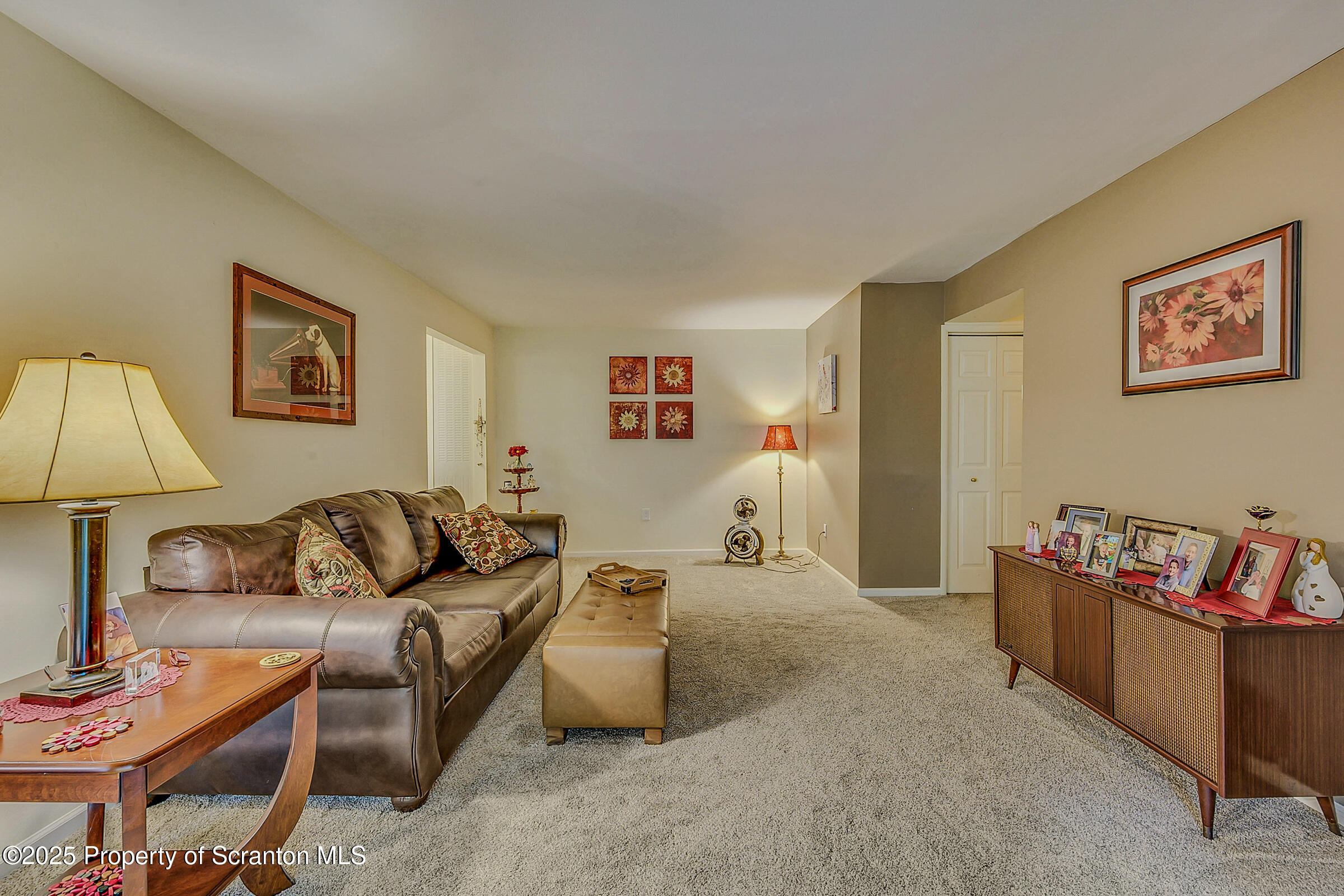 1504 Summit Pointe, Unit 1504 Scranton, PA 18508 - Photo 7 of 22 a living room with furniture and a couch