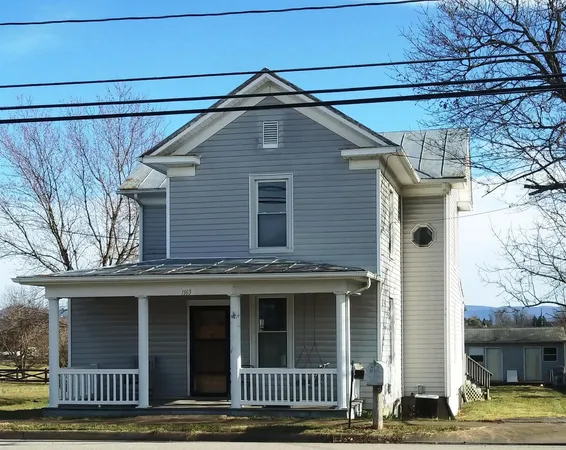 a front view of a house with a garage