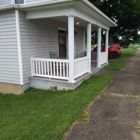 a view of porch with large windows