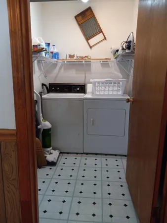a bathroom with a sink and cabinets