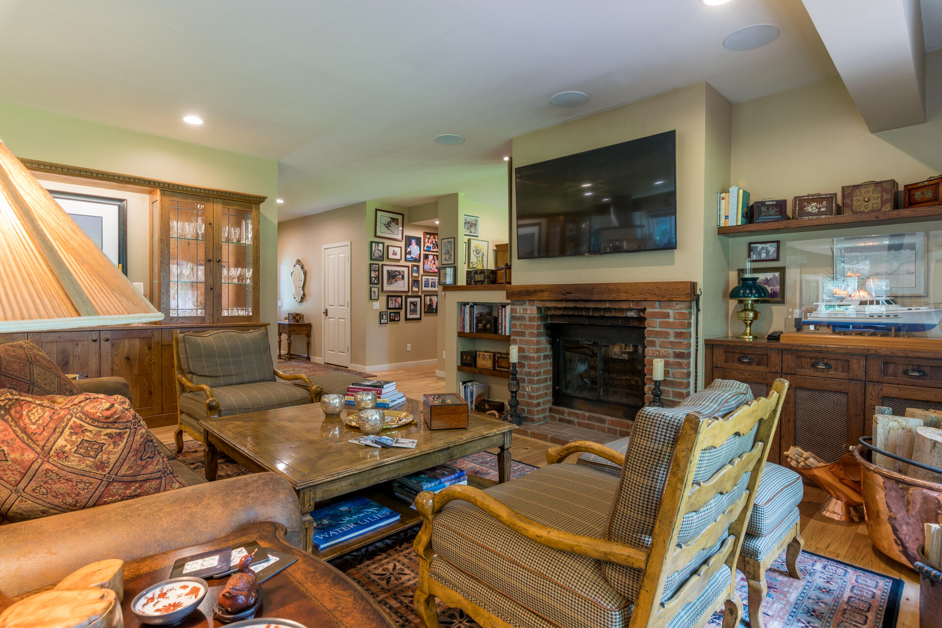 102 Willow Road Blaine County, ID 83333 - Photo 23 of 38 Great room with TV and fireplace