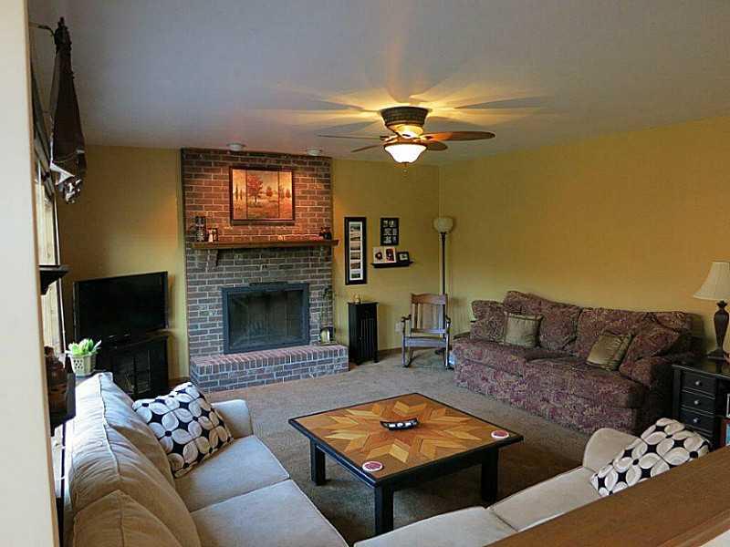 206 Waugaman Road Harrison City, PA 15636 - Photo 3 of 24 Family Room. Cozy family room with log burning fireplace
