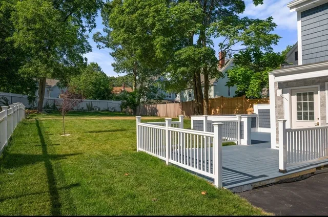 a view of a wrought iron fences in front of house