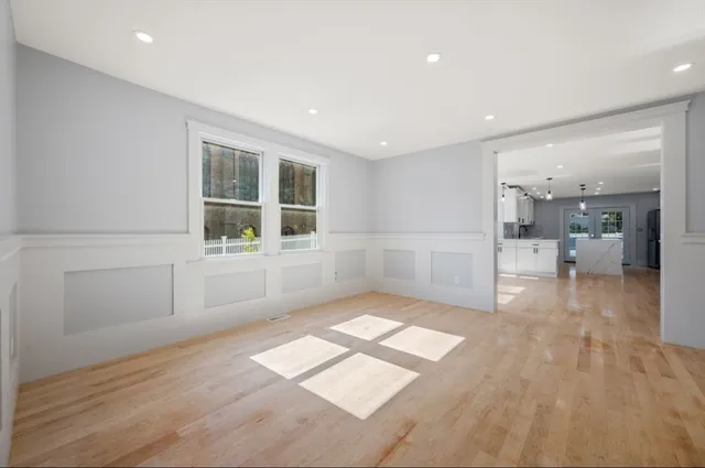 a view of livingroom with furniture and windows
