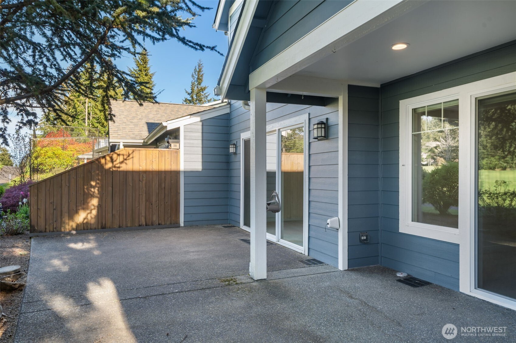 160 East Soderberg Road, Unit C7 Allyn, WA 98524 - Photo 30 of 39 a view of a house with a outdoor space