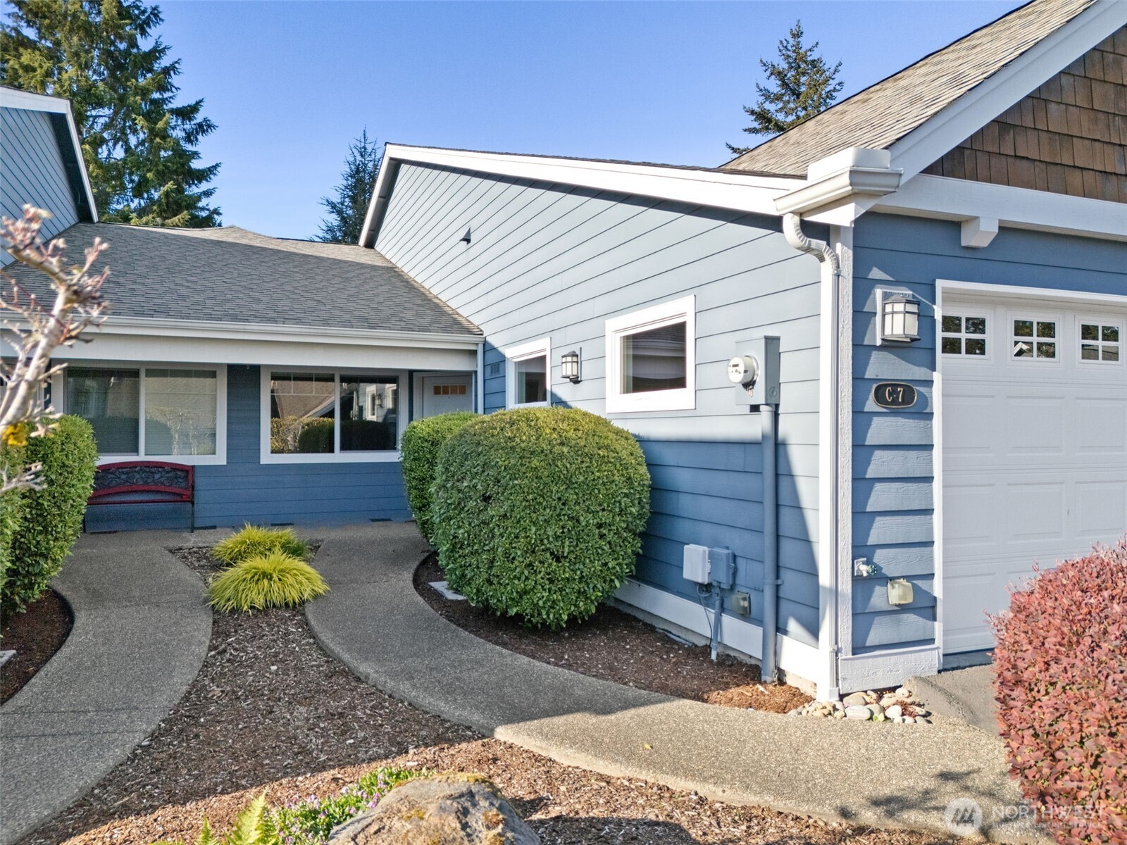 160 East Soderberg Road, Unit C7 Allyn, WA 98524 - Photo 35 of 39 a view of a house with a backyard