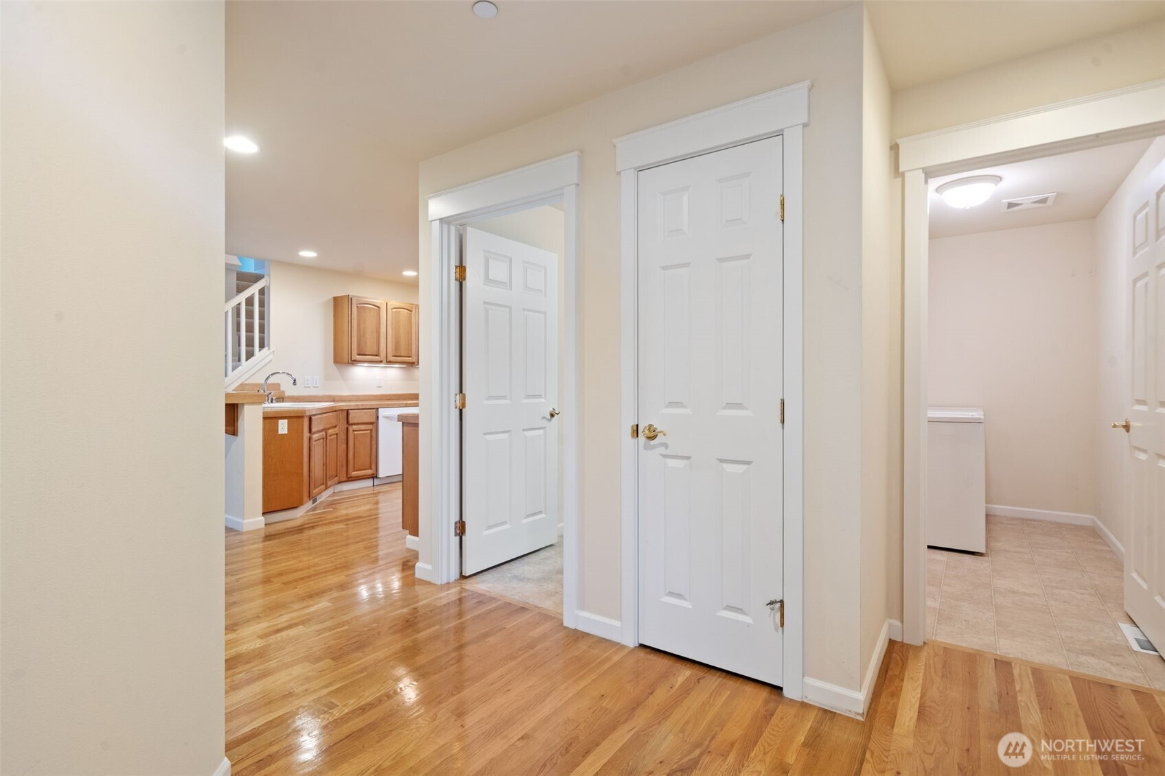 160 East Soderberg Road, Unit C7 Allyn, WA 98524 - Photo 5 of 39 a view of a kitchen from the hallway