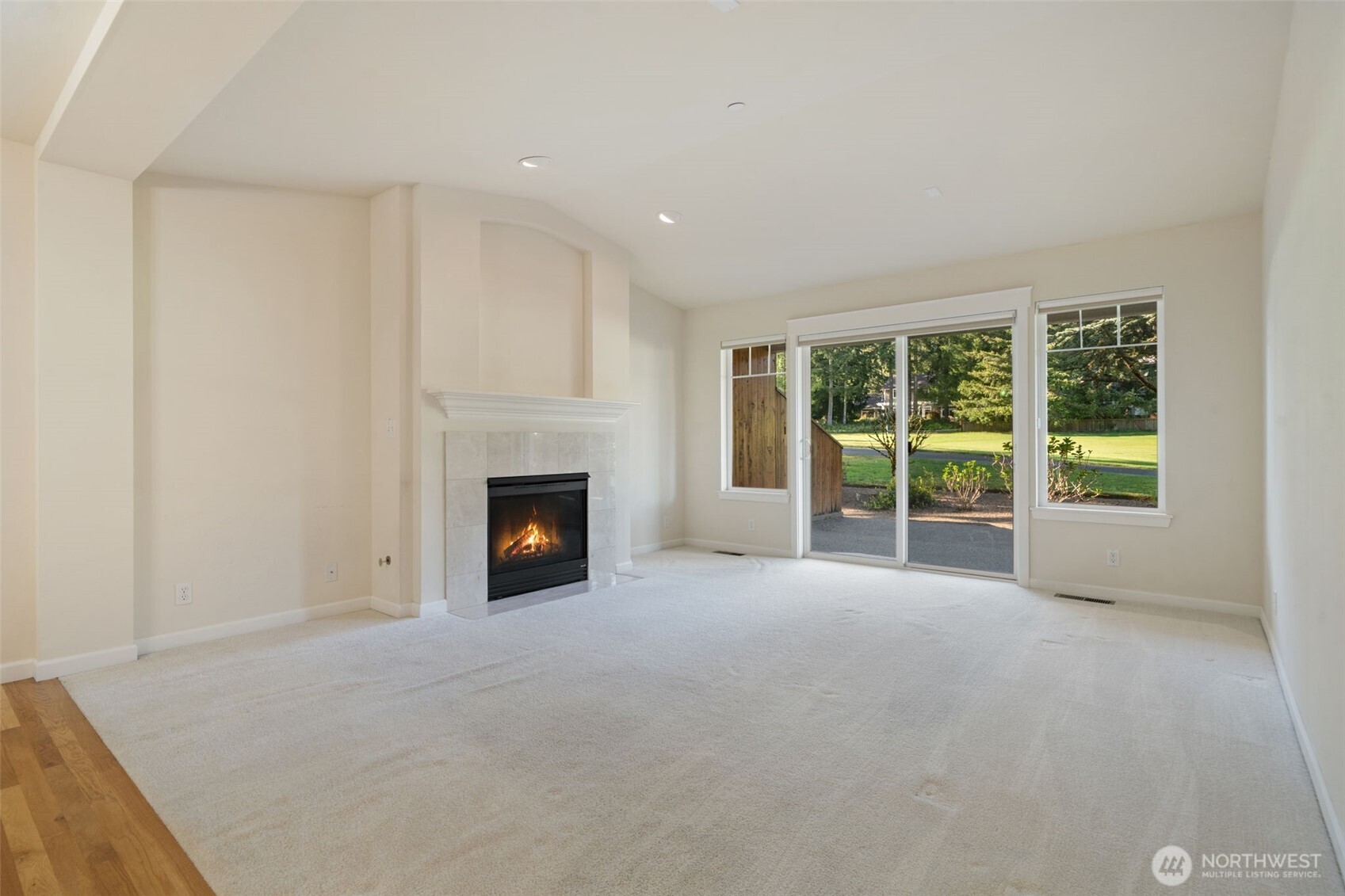 160 East Soderberg Road, Unit C7 Allyn, WA 98524 - Photo 8 of 39 a view of a room with an empty room and fireplace