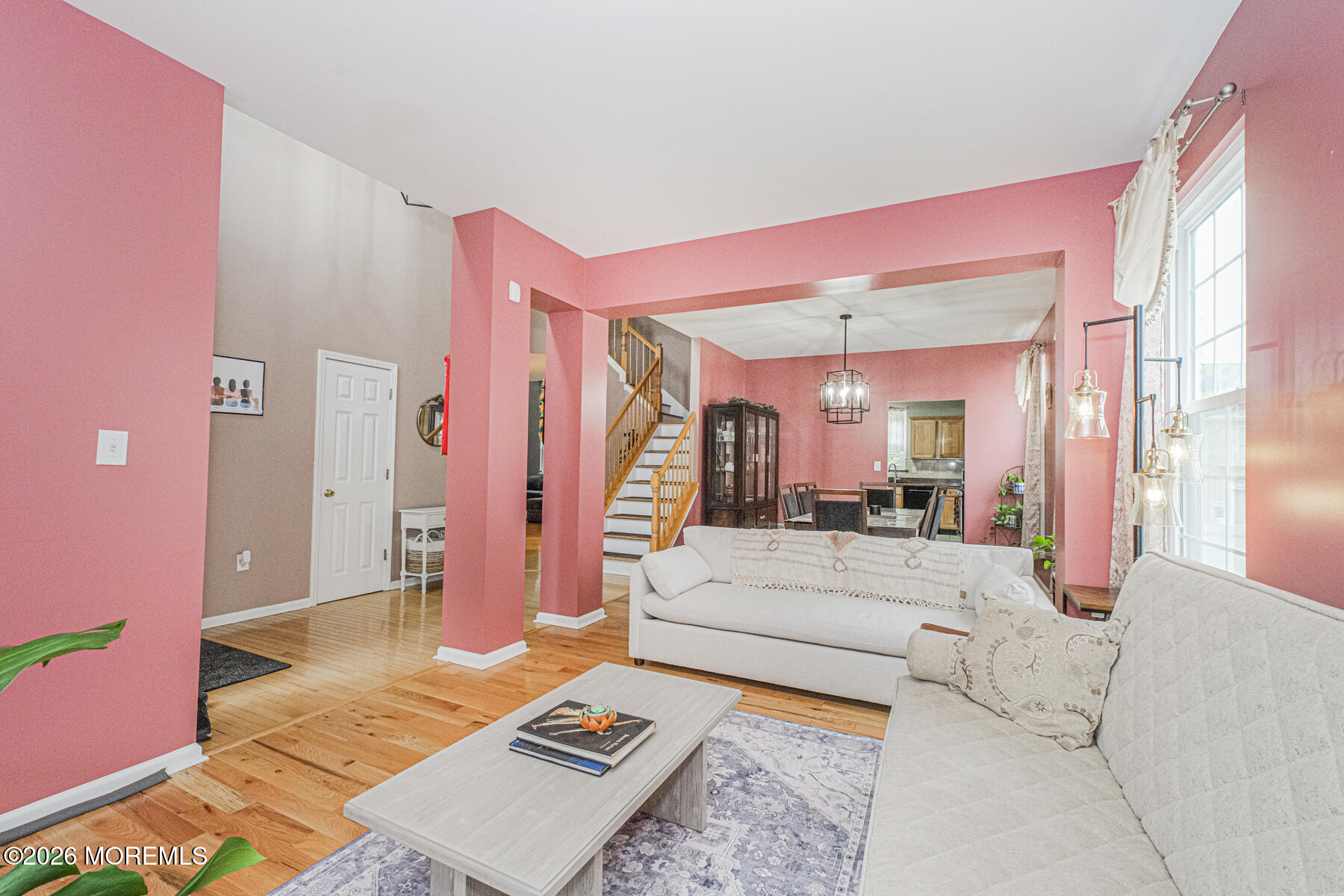 315 Wedgewood Road Morganville, NJ 07751 - Photo 5 of 37 a living room with furniture and a large window