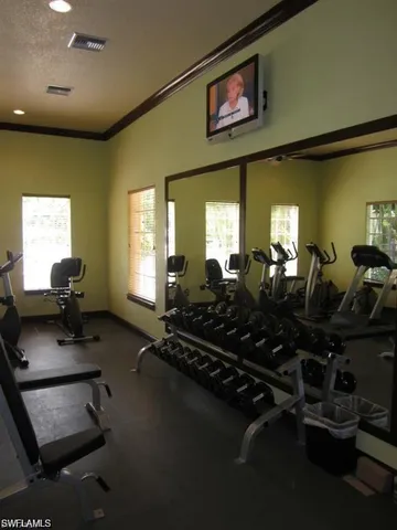 a view of a chairs and tables in patio