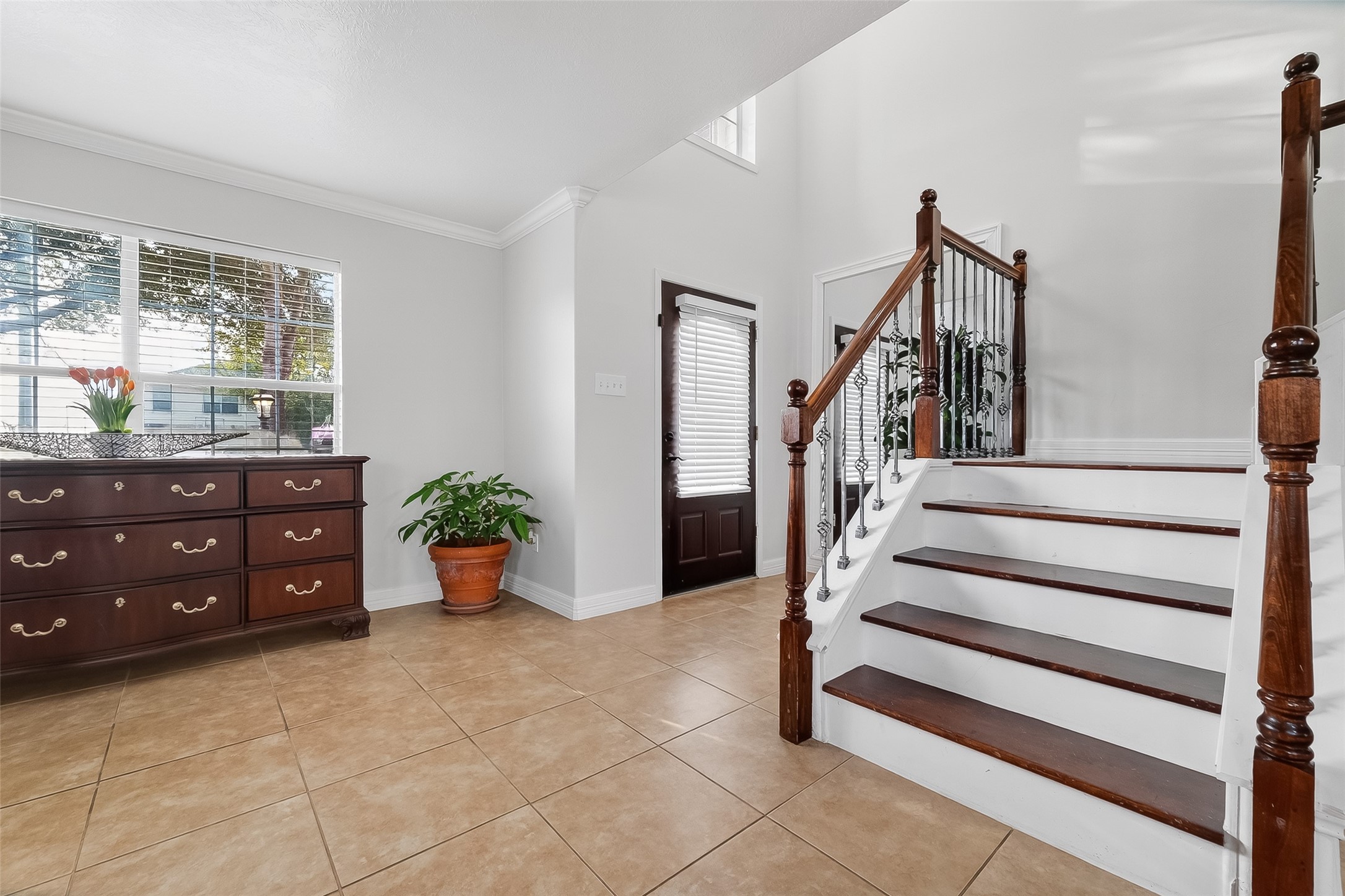 5902 Camron Point Circle Katy, TX 77449 - Photo 21 of 44 Inviting entry with hardwood floors and staircase leading to the second level.