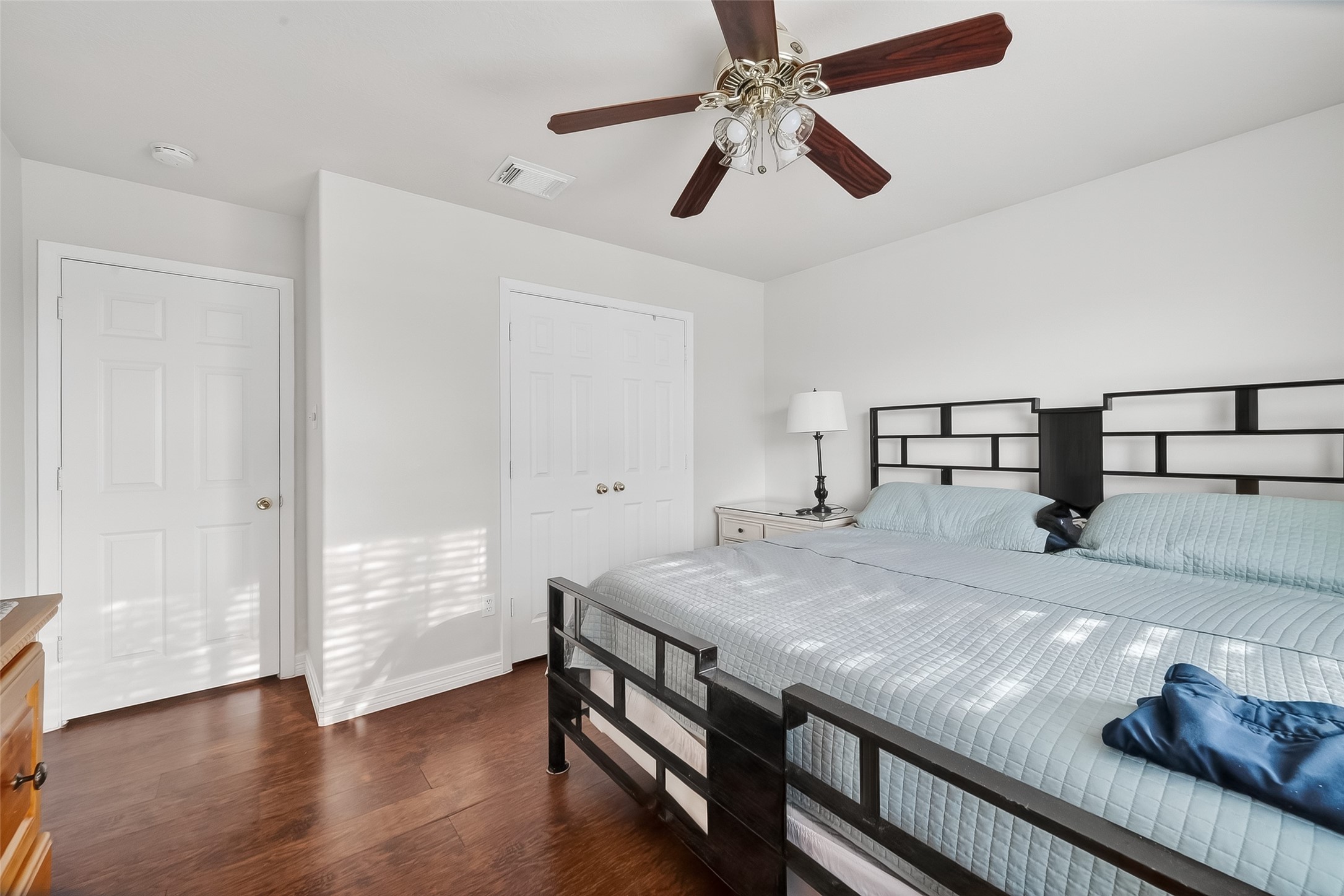 5902 Camron Point Circle Katy, TX 77449 - Photo 24 of 44 Alternate view of secondary bedroom featuring generous space, neutral tones, and ceiling fan.