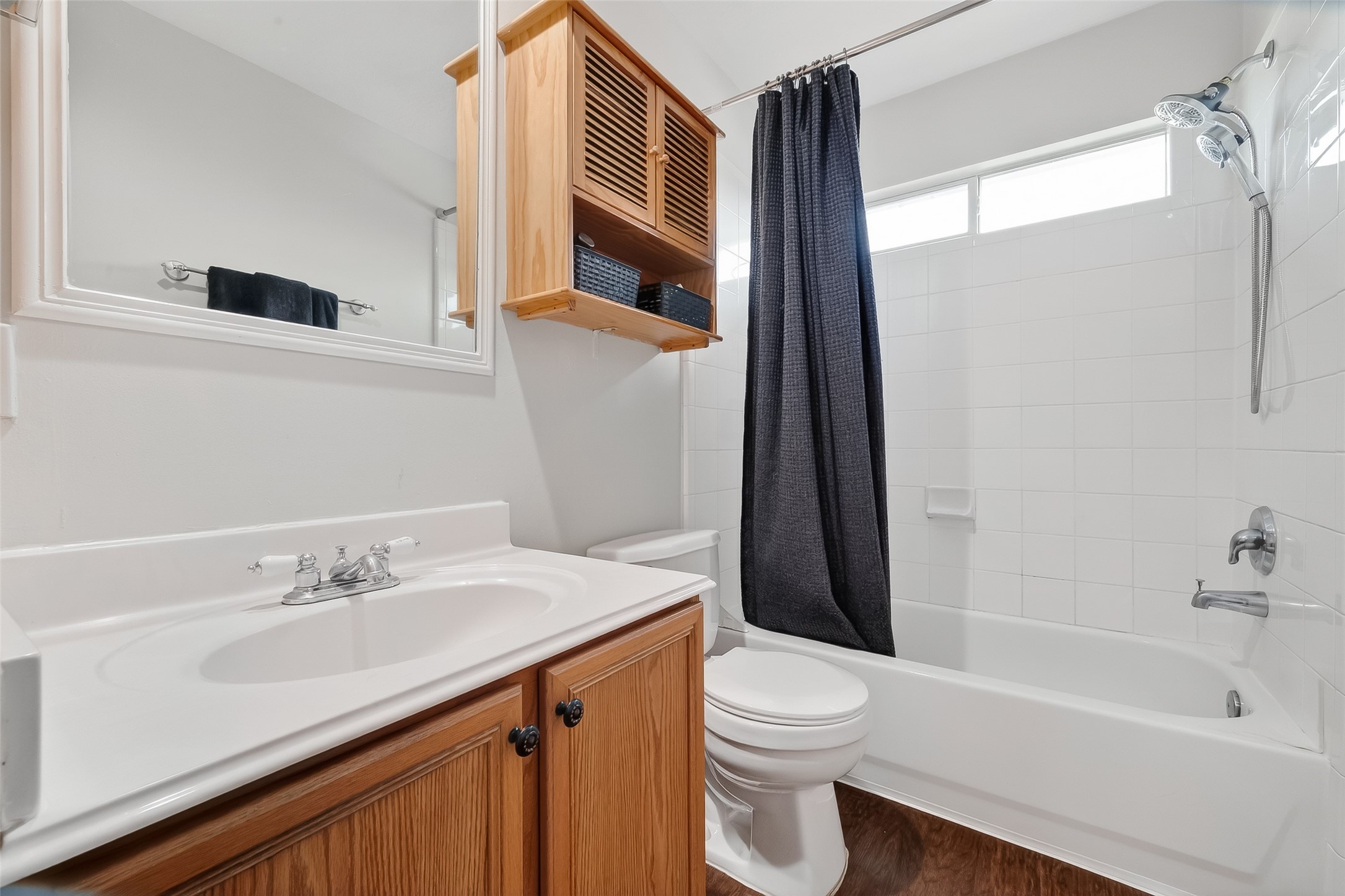 5902 Camron Point Circle Katy, TX 77449 - Photo 25 of 44 Full bathroom with tub/shower combination, vanity with storage, and natural light.